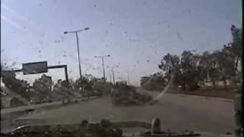 Military Police Roll Through IED Under Bridge