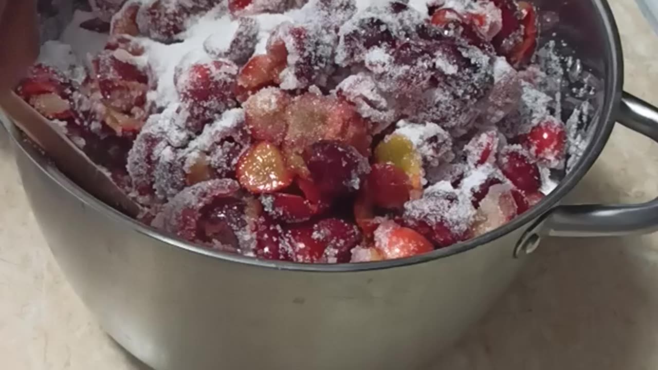 Mixing ingredients for cherry plum jam