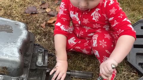 Toddler Uses a Wrench