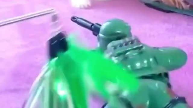 cute cat scared of a toy