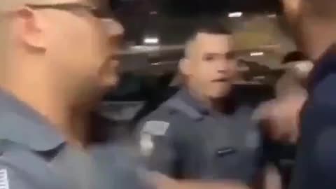 Brazilian Police Officer reminds unruly citizen this ain't America