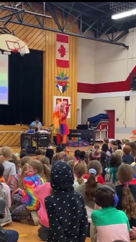 Transgender Singing to Auditorium of Children in Canadian public school system