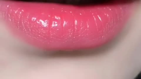 girl applied lipblum on her lips