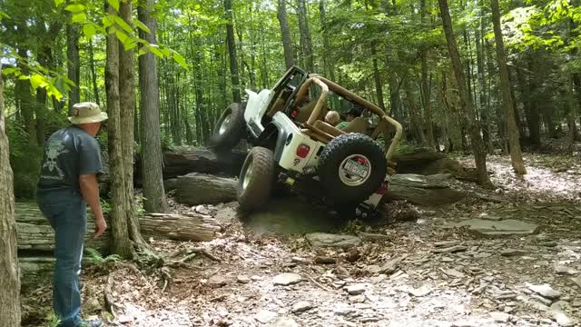 I love the driveshaft on the tree, tough rock climb here, upstate NY