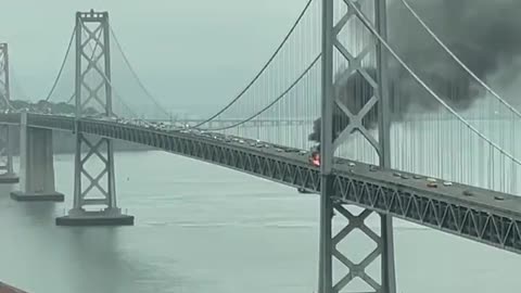 Truck on fire on the Bay Bridge in San Francisco.