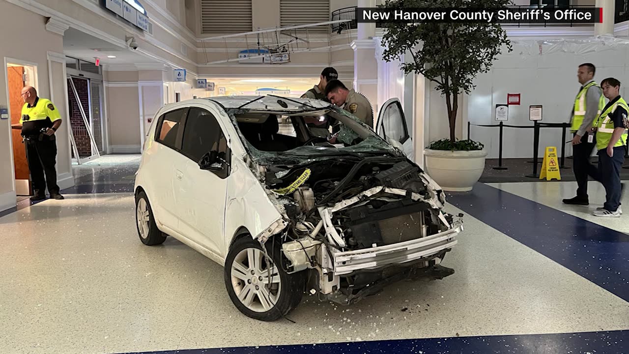 Car crashes into airport terminal in North Carolina