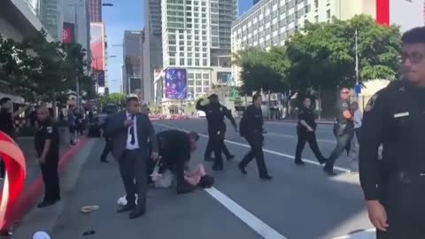 Pro-abortion activist tackled by Secret Service in LA, after she approached Biden's motorcade