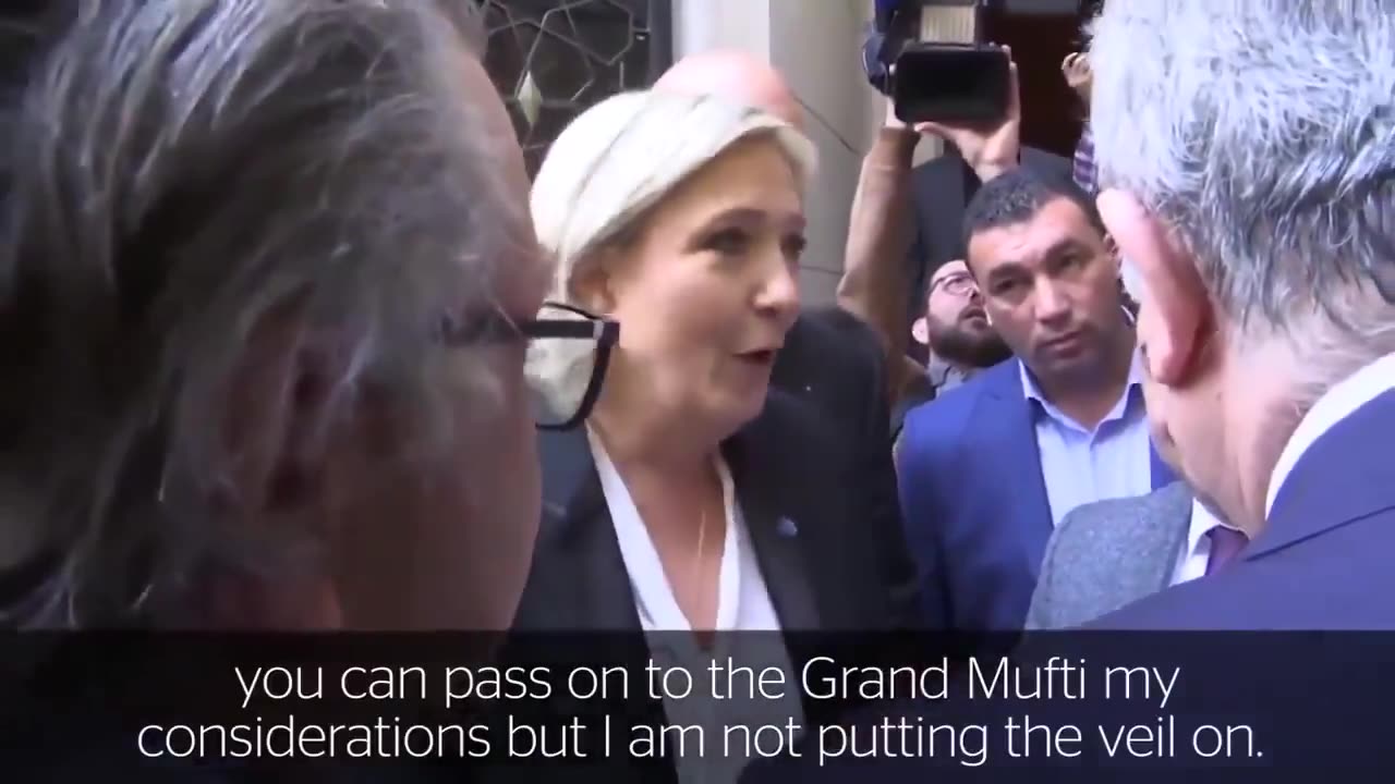 Marine Le Pen - No, I'll not wear a veil. Mufti can go f*ck himself. (Paraphrase)