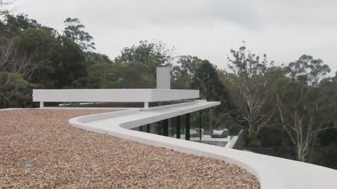 Inside a Concrete Super House That Hangs Over a Cliff (House Tour)