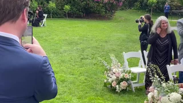 Colonel Runs Down Wedding Aisle Crashing into Mic Stand