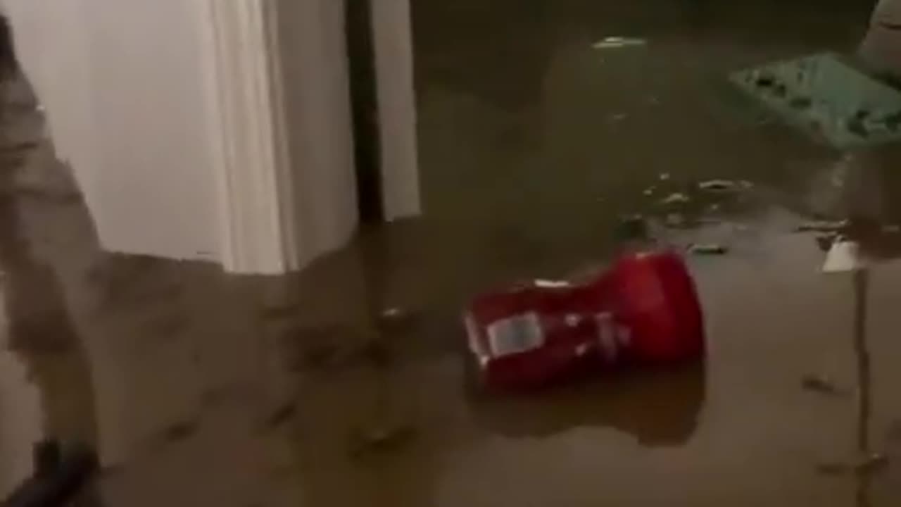 Family In Flooded House