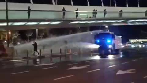 Israel: Police use water cannons on vaccine passport protesters Dec. 18, 2021