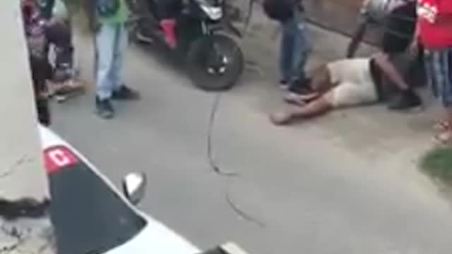 Man with knife been attacked by people