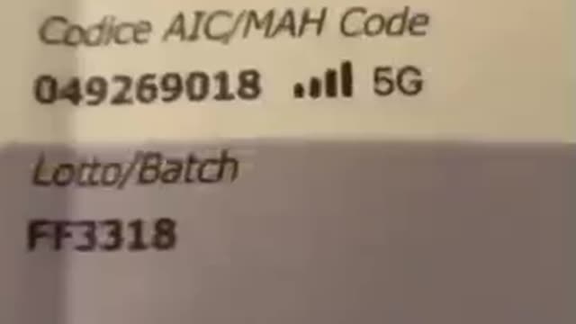 Vaccinated against COVID 19 shows a vaccination document that contains a personal code for 5G!