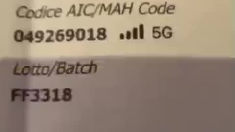 Vaccinated against COVID 19 shows a vaccination document that contains a personal code for 5G!