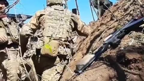 Russian Crawls to Ukrainian Trenches to Surrender