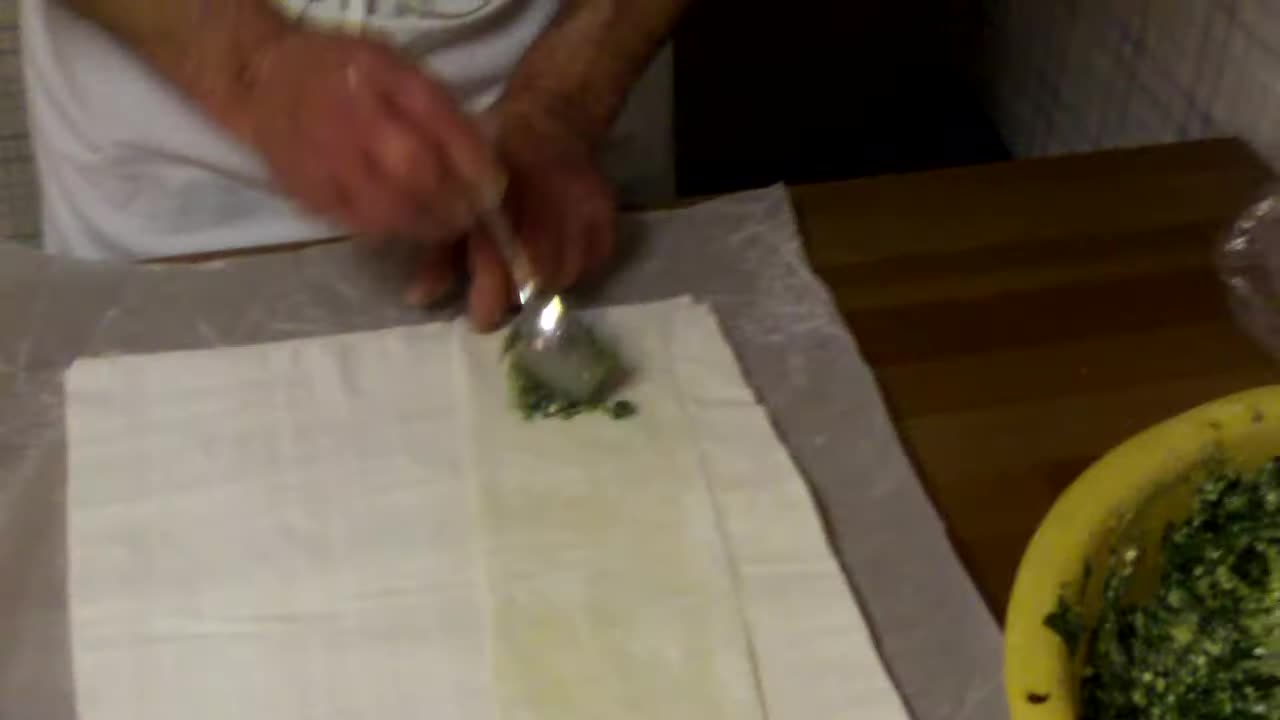 Traditional Greek Spanakopita Being Made By My Late Father