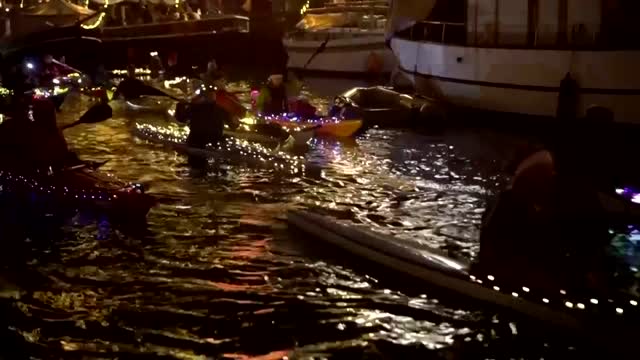 Decorated canoes light up Copenhagen canals