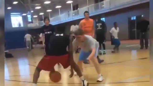 Kid gets WRECKED on the court!