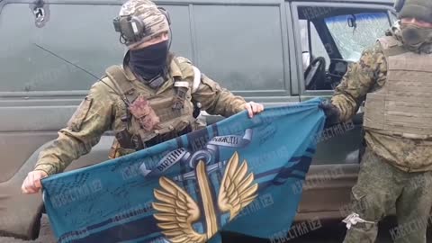 Trophy flags of the Armed Forces of Ukraine and the "Right Sector" in Mariupol