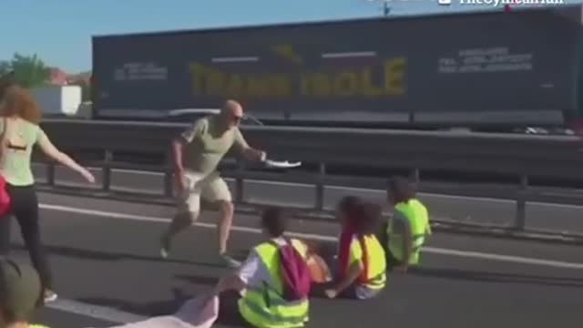 Furious locals physically drag “activists” off the highway