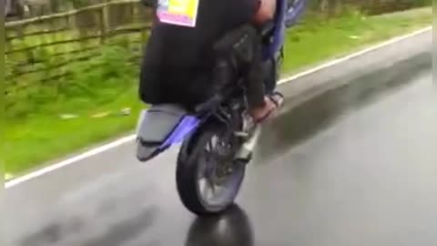 Bike stunt on highway