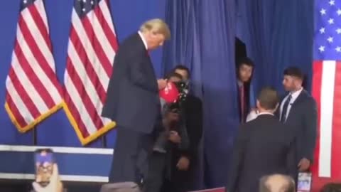 President Donald Trump Catches MAGA Hat and Sharpie for Autograph