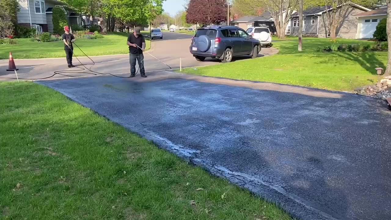 Professional Asphalt Spray Sealing: “The Cool Customer Sealed One” Top Coats Pavement Maintenance