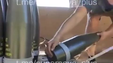 Wild Agressive Transfer of 155-mm NATO Artillery shells to a frontline supply truck