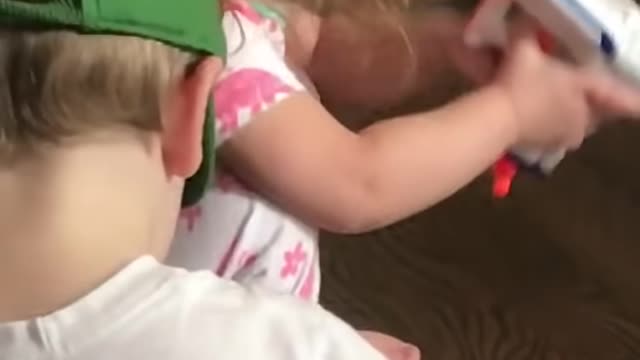 Girl shoots self with nerf gun