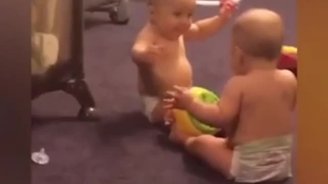 Cute kids talking & laughing at home.