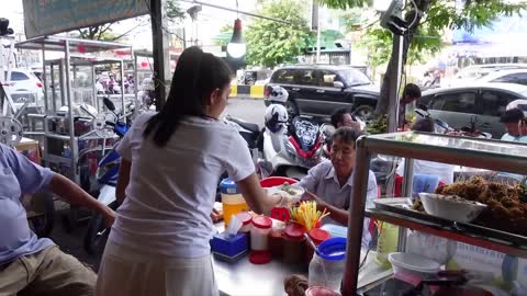 Popular Chicken Egg Yolk Rice Congee _ Cambodian Street Food