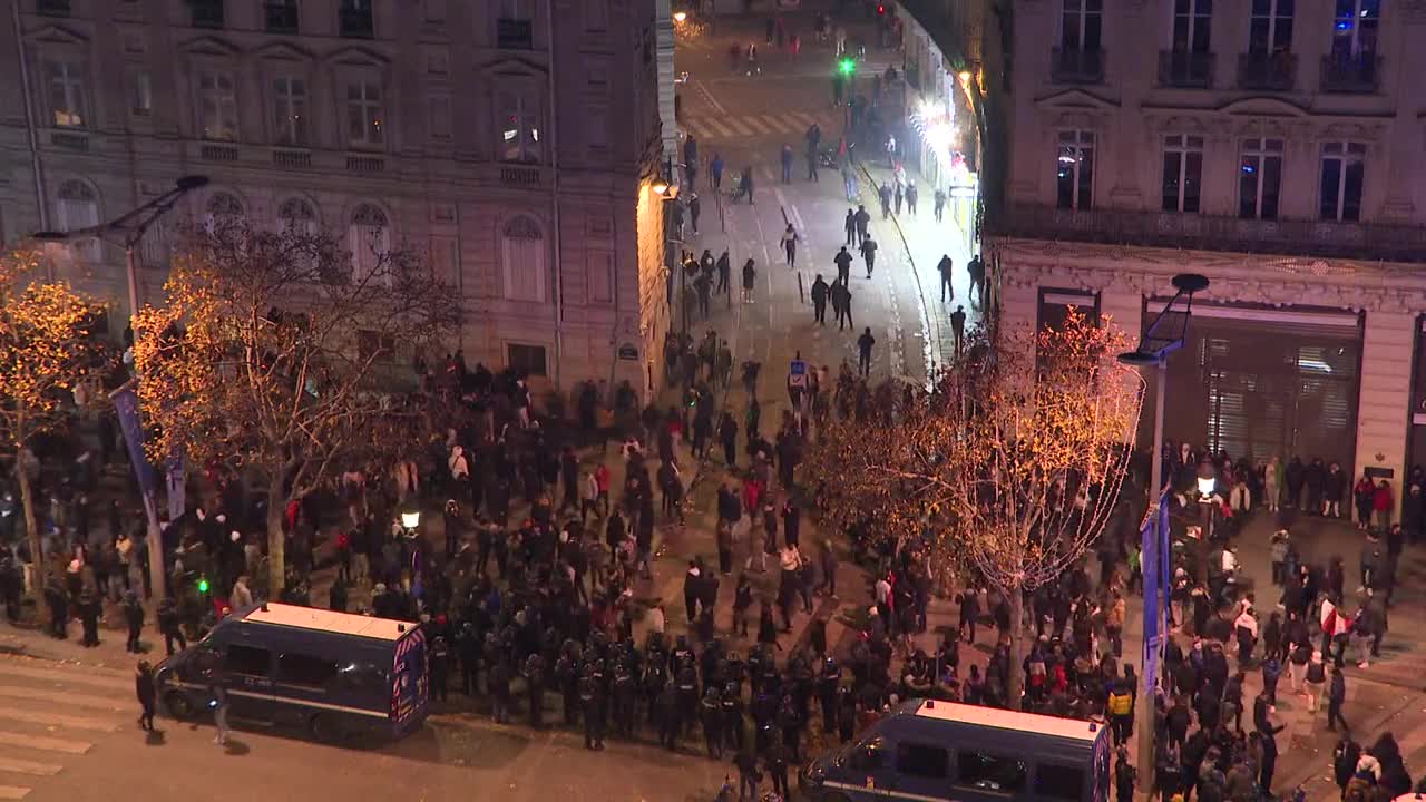 French police chase rioters in Paris after France WC win over Morocco