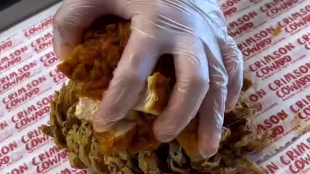 How much would you pay for this blooming onion loaded w Mac and hot chicken from @Crimson Coward