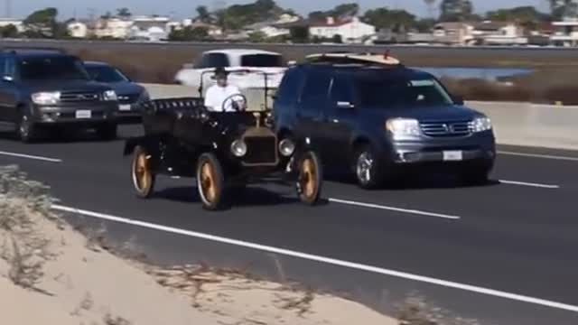 A Ford Model T trying to blend in with today's traffic