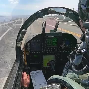 View from inside a F-18 cockpit taking off from an aircraft carrier. Video by Ayesha Creates.