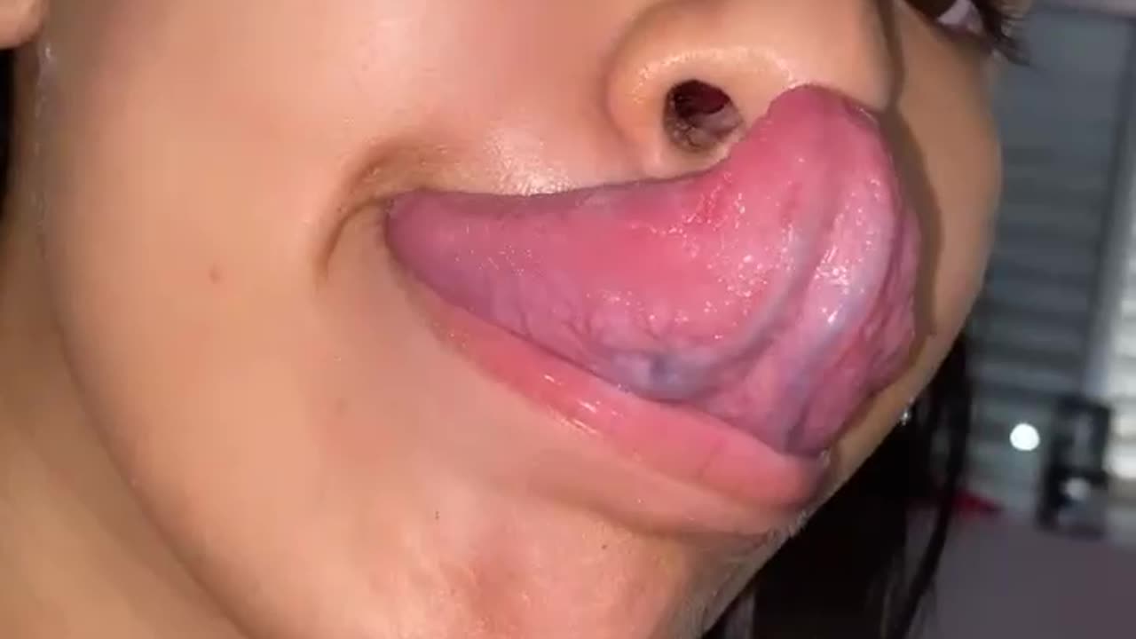 beautiful girl super long tongue