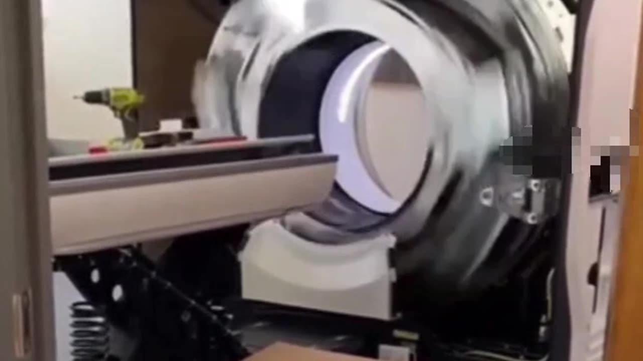 CT Scanner at speed with cover