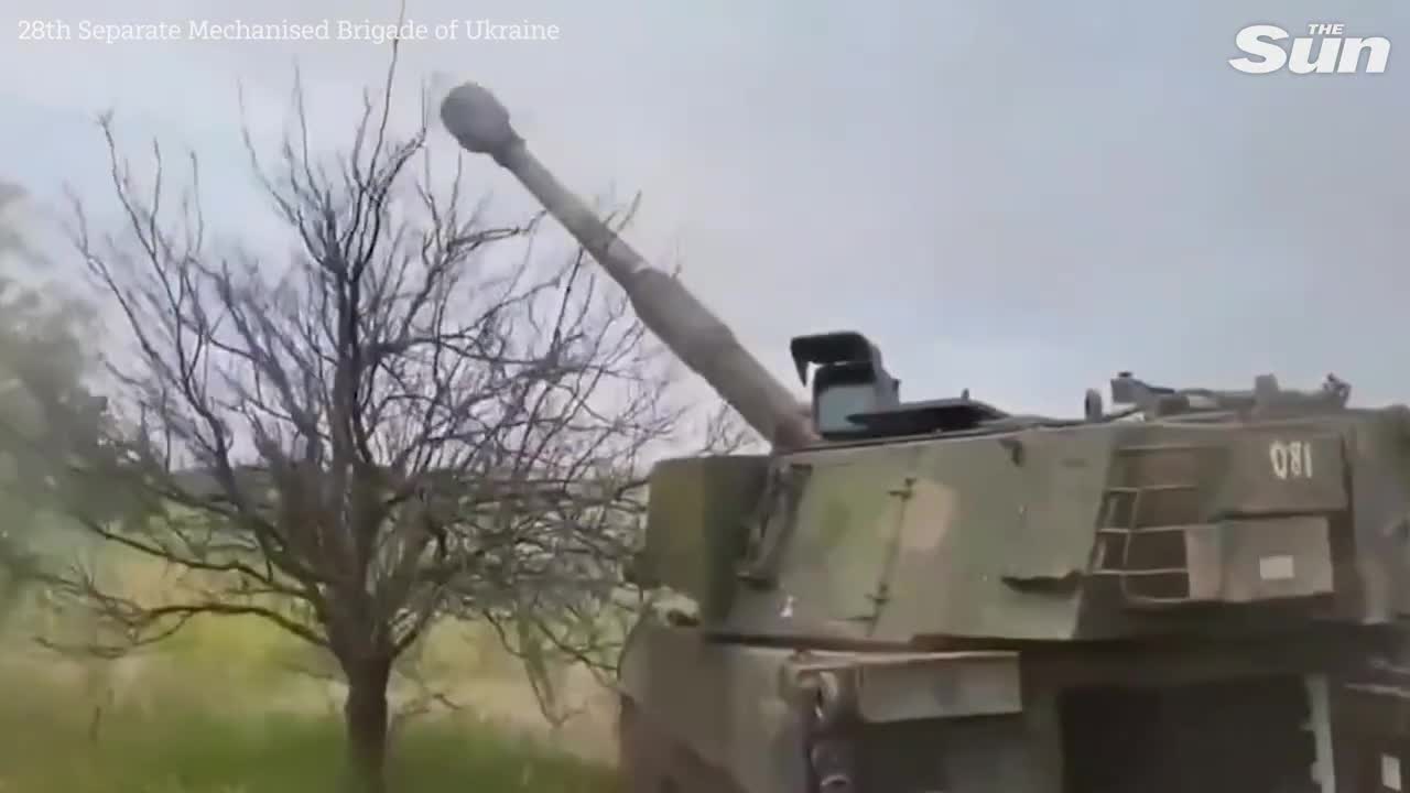 Ukrainian soldiers shell Russian positions with M109 howitzer artillery guns