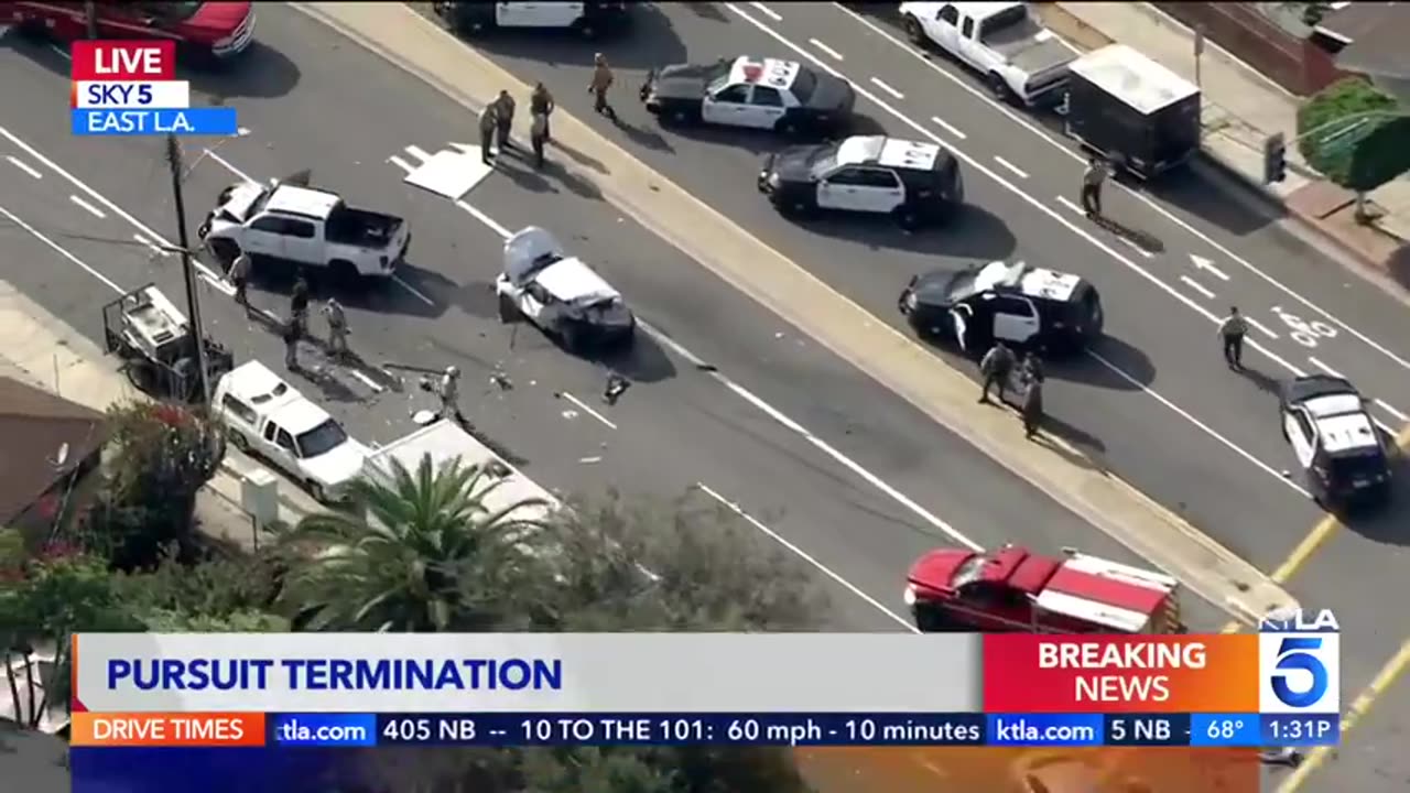 A pursuit in East Los Angeles ended in a violent crash involving multiple vehicles