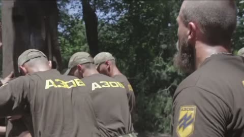 Azov members realize a blood pagan ritual.