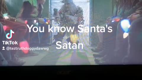 Santa is Satan watch happy and see how fked up our world we live in