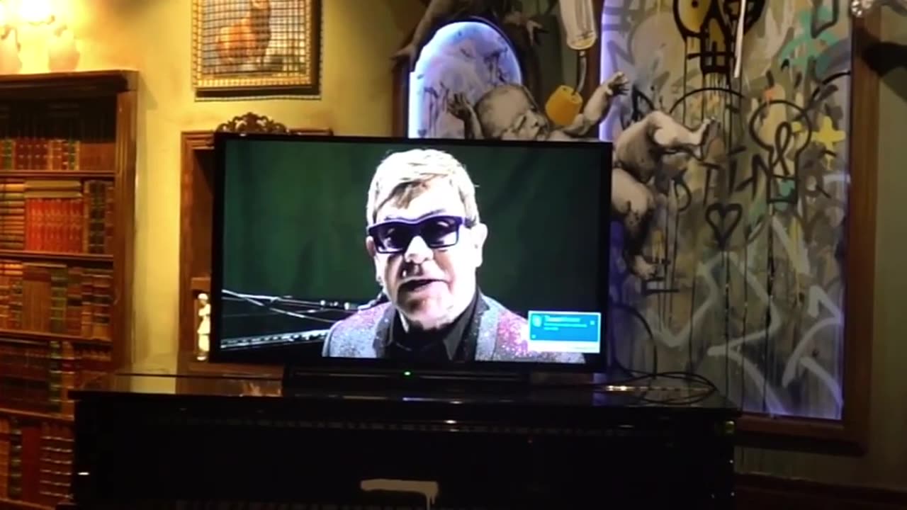 Banksy - Watch Elton playing the opening party remotely at The Walled Off Hotel (March 5, 2017)