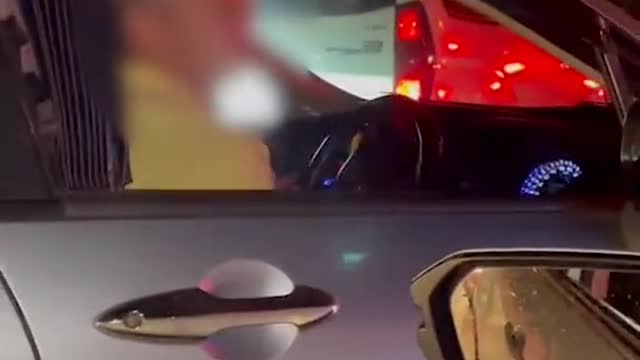 Little girl shows middle finger at Tuas second link