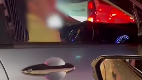 Little girl shows middle finger at Tuas second link