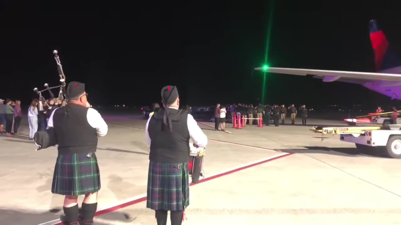 Bag pipes play "Amazing Grace" as Arizona police officer Josh