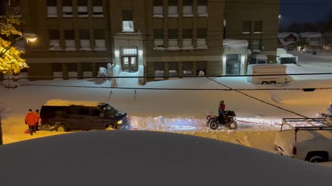 Using Two Four-Wheelers to Pull Van Out of Deep Snow