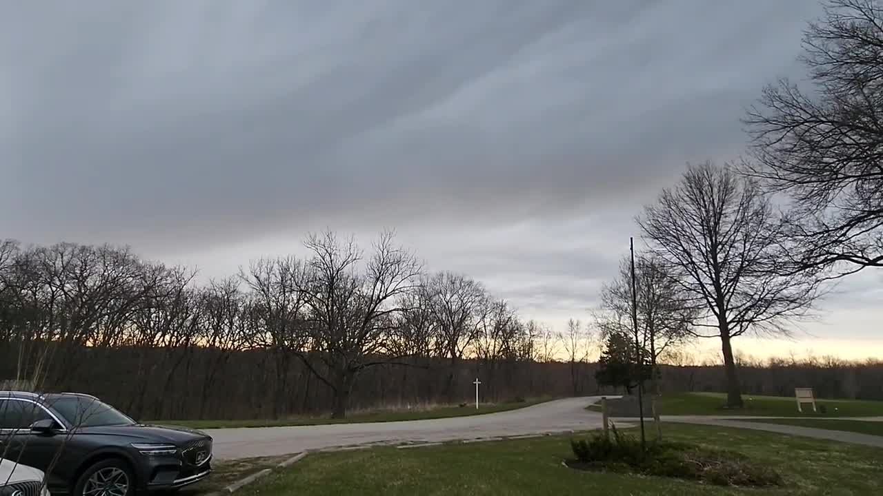 Lightning Bolt Strikes the Ground and Spreads across the Sky