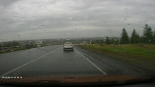 Truck Skidding on Highway on Wet Roads