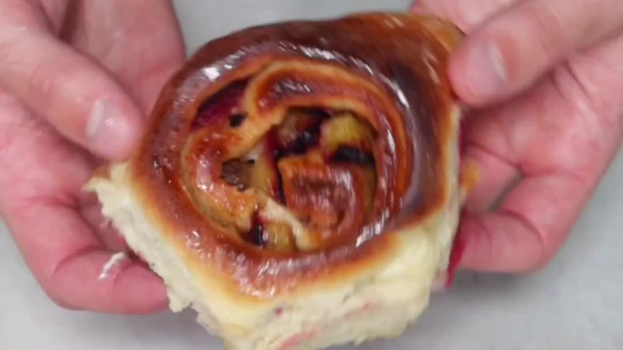 "Step up Your Brunch Game with Delectable Plum Cinnamon Rolls: A Twist of Flavors in Every Bite!"
